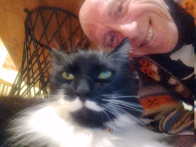 David and his moustachioed cat