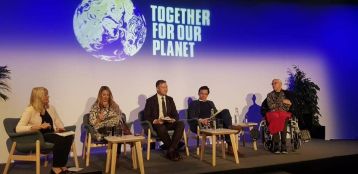 David launching the One Planet Standard onstage at COP26